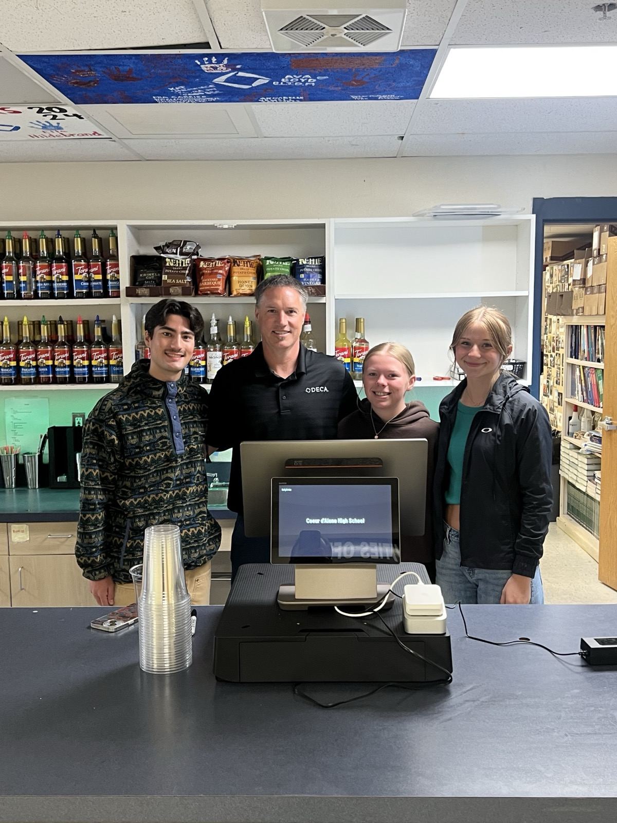 Tony Carrico and students running the Coeur d'Alene High School DECA store on RallyOrder